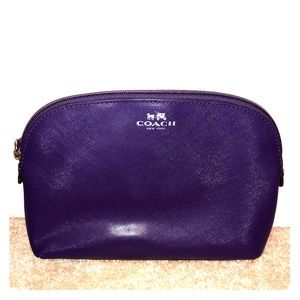 Purple Coach cosmetic bag